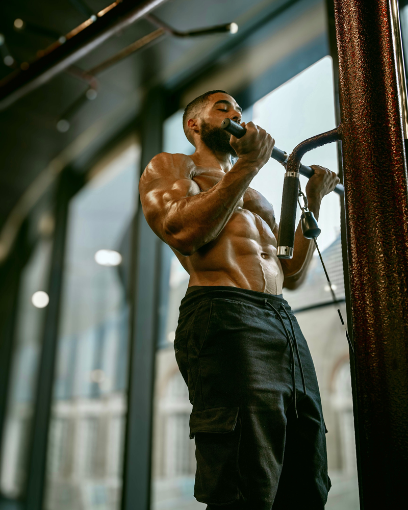 The coach is working out at the gym.